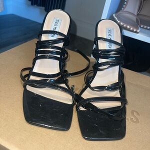 I’m selling these black Steve Madden strappy heels